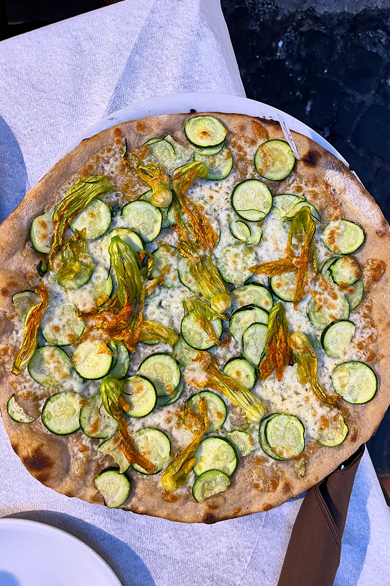 Gluten-free zucchini flower pizza in Rome.