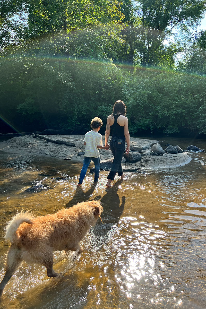 A family hiking with Floozy (the dog) in Amherst, Massachusetts.