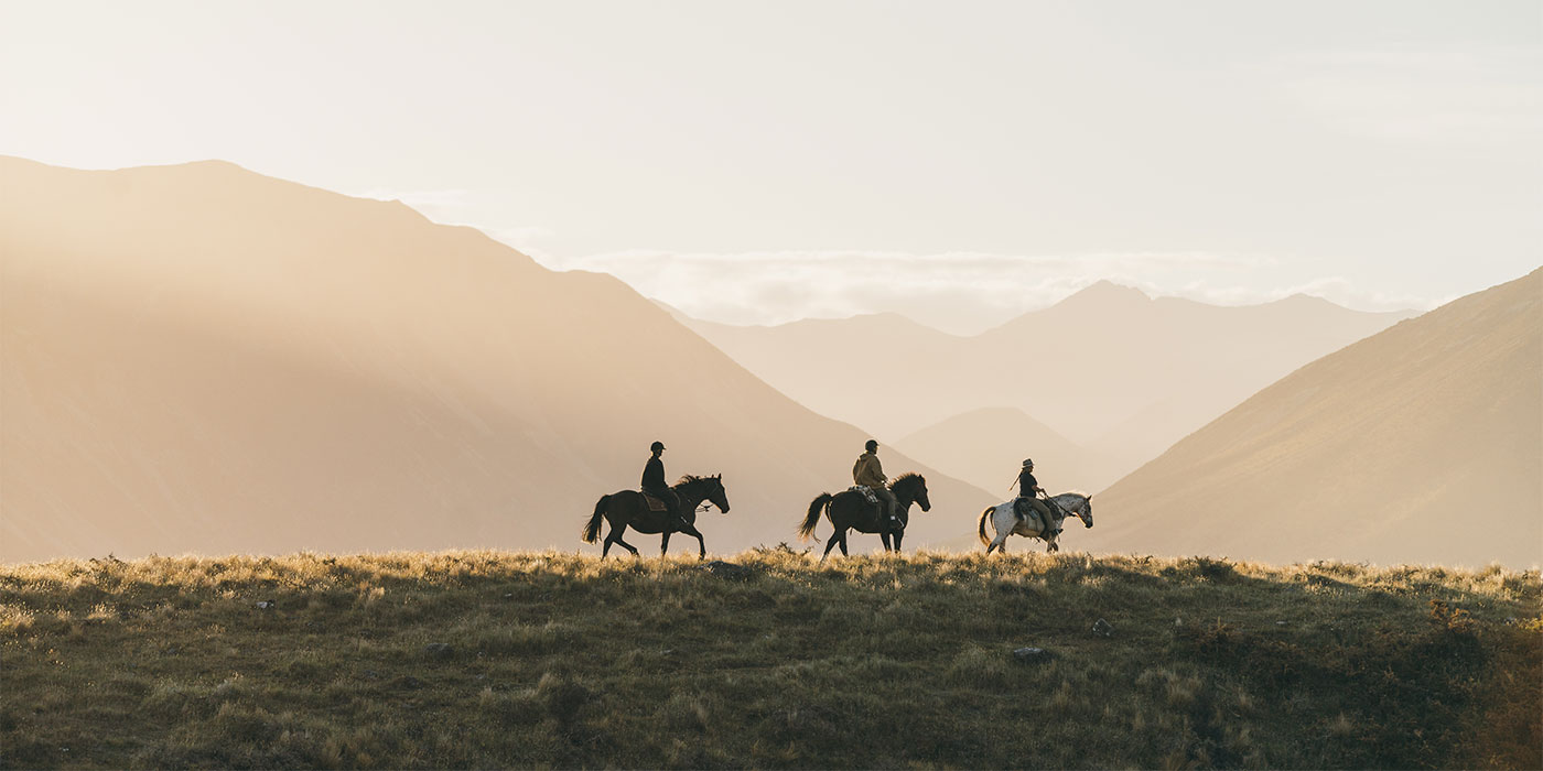 Horseback riding through the countryside.